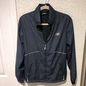 New Balance women’s size small gray windbreaker jacket.